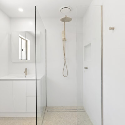 Modern bathroom design in garage conversion Gold Coast with tiled ensuite