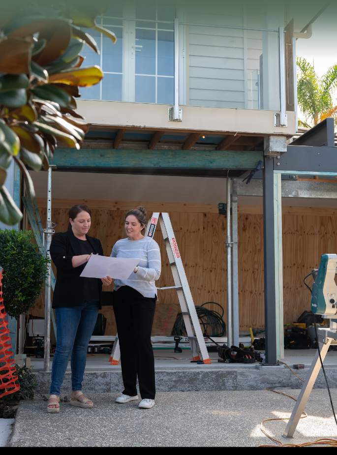 Reviewing renovation plans Meeting with a homeowner to discuss a renovation fixed price building contract